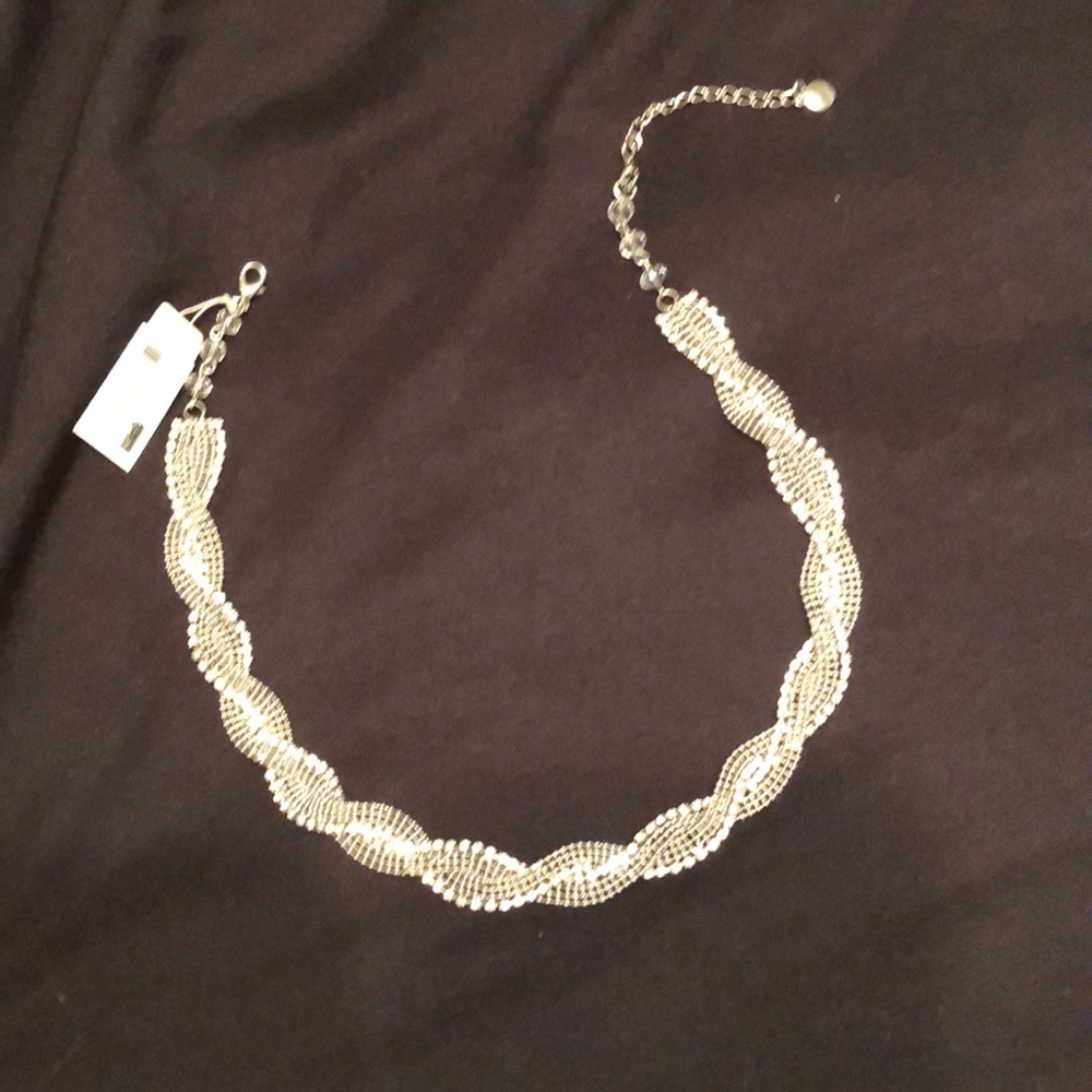silver braided necklace.